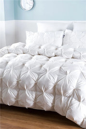Goose Down Duvet Insert  on a bed