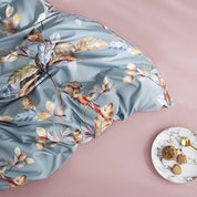 Close up of fabric and pattern of Parrot Sanctuary Bedding Set