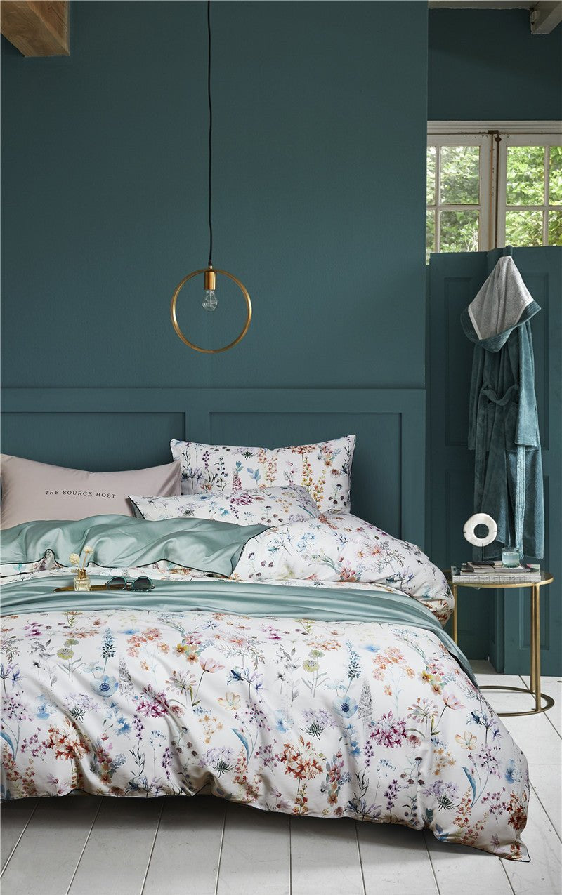 Blooming Jade Bedding Set on a bed