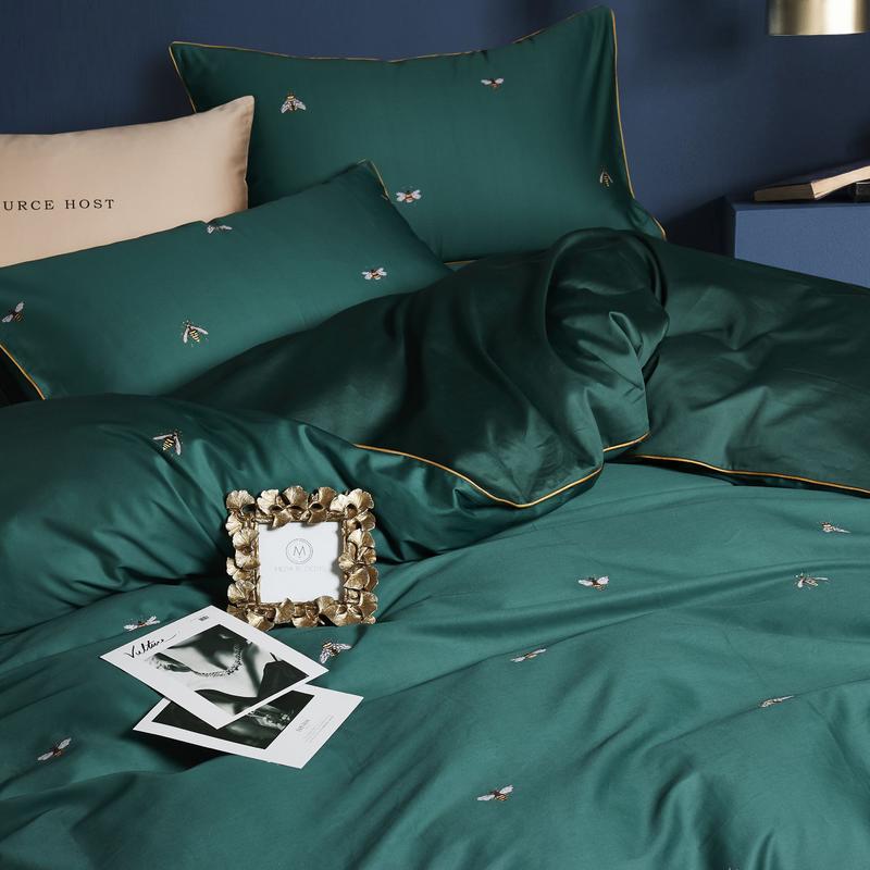 Close in shot of the Emerald Honey Bee Bedding Set on a bed