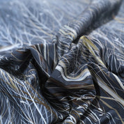 Close up of fabric and pattern from the Midnight Forest Bedding Set