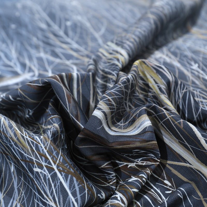 Close up of fabric and pattern from the Midnight Forest Bedding Set