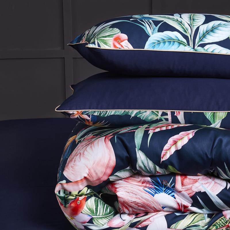 Folded bedding from the Navy Flamingo Bedding Set