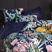 Navy Flamingo Bedding Set on a bed - close up view