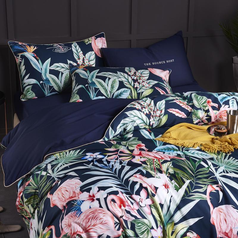 Navy Flamingo Bedding Set on a bed - close up view