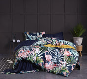 Navy Flamingo Bedding Set on a bed - front view