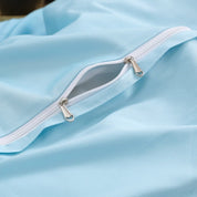 Close up of zipper closure for duvet cover from the Sky Blue Garden Bedding Set
