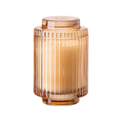 Brown ribbed glass jar with a lid on a white background