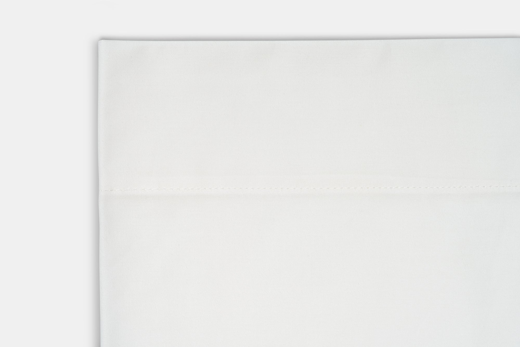 Closeup_of_Hem_Color_White_Bed_Sheet_Set_Percale_Natural_Cotton_Made_in_USA.jpg