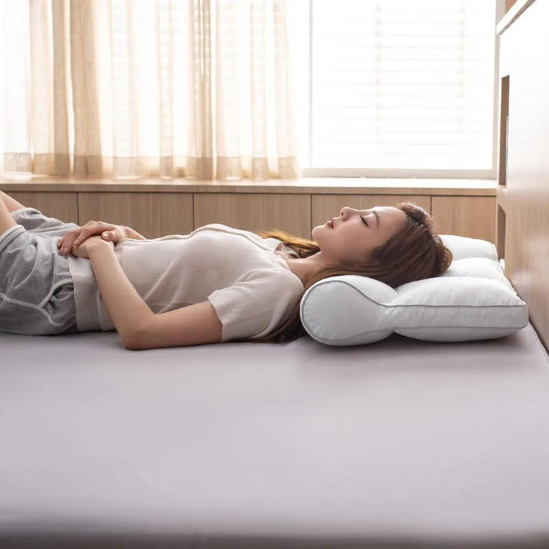 Woman laying on Contoured Pillow