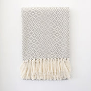 Folded Casa Cubita Throw Blanket