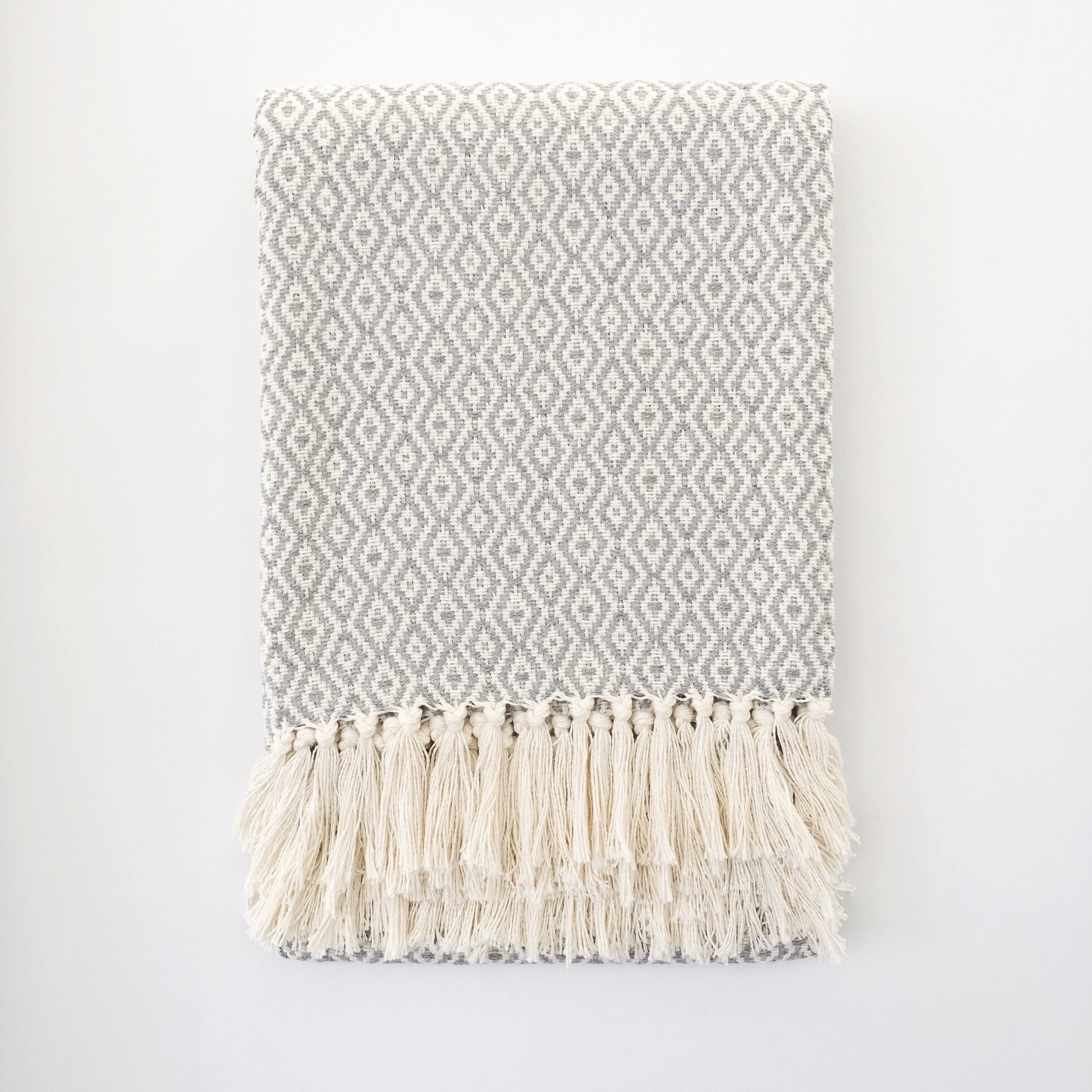 Folded Casa Cubita Throw Blanket