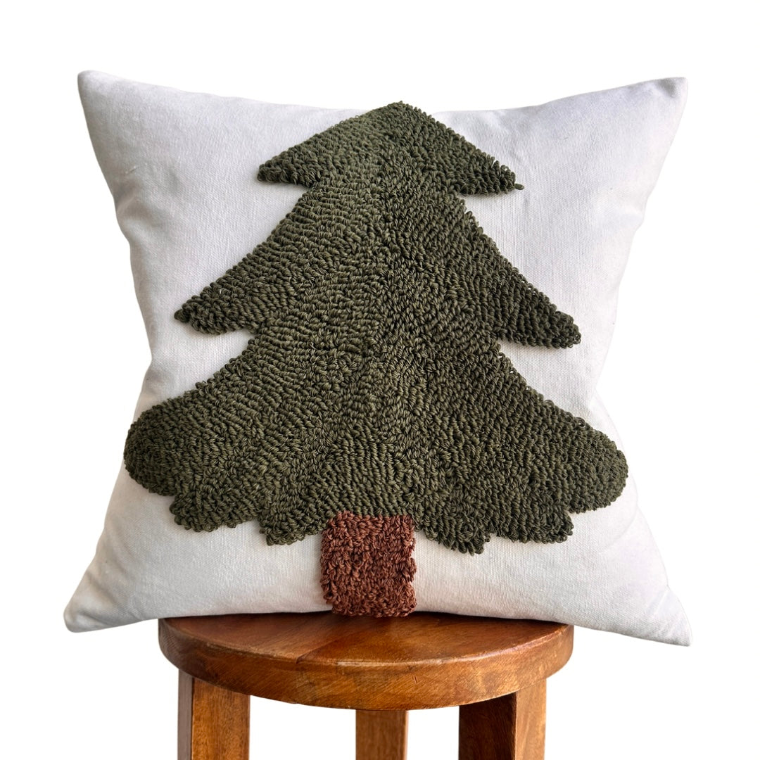 Decorative pillow with a tree pattern on a white background