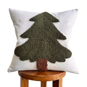 Decorative pillow with a tree pattern on a white background