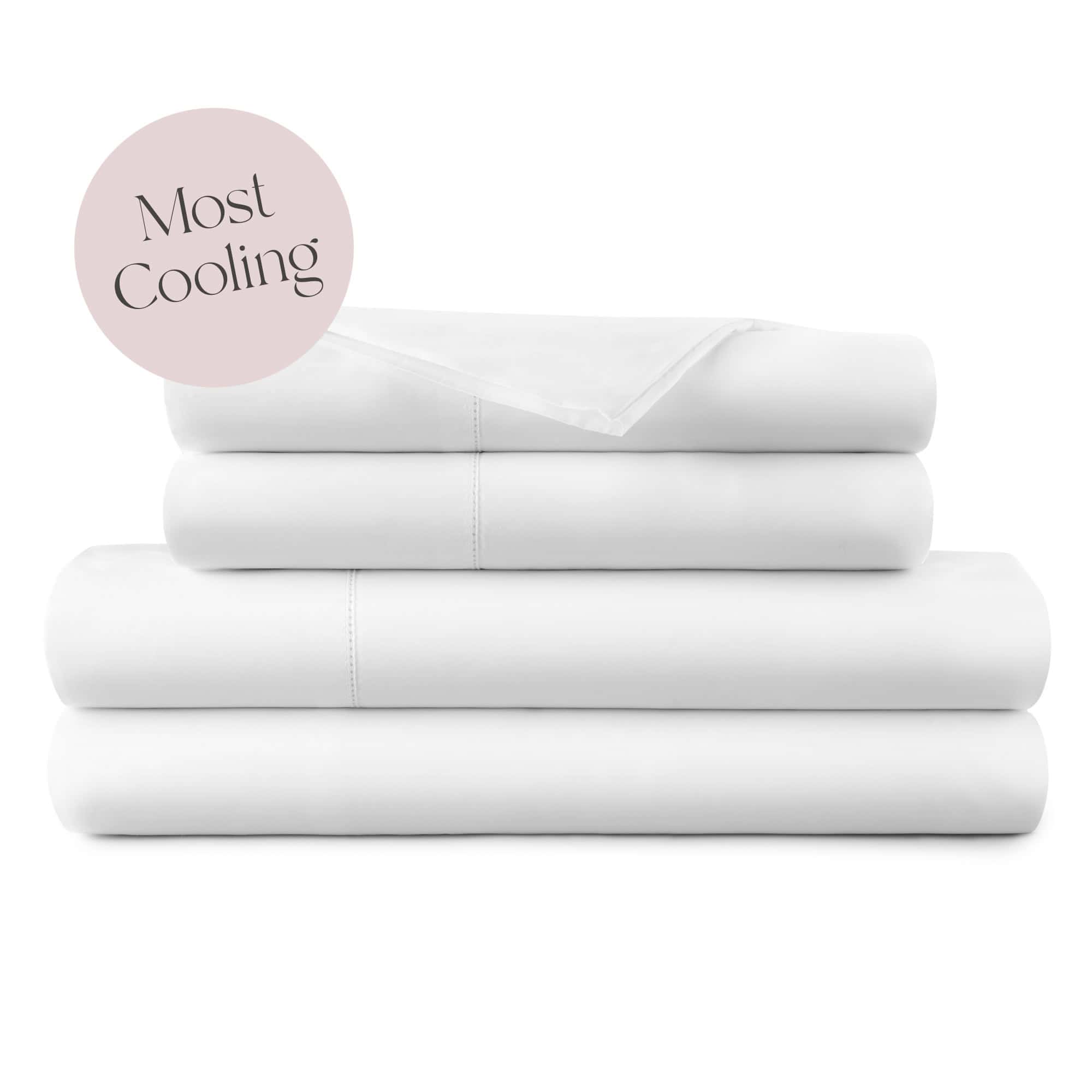 Stack of white bedding with a pink circle labeled 'Most Cooling' on a white background