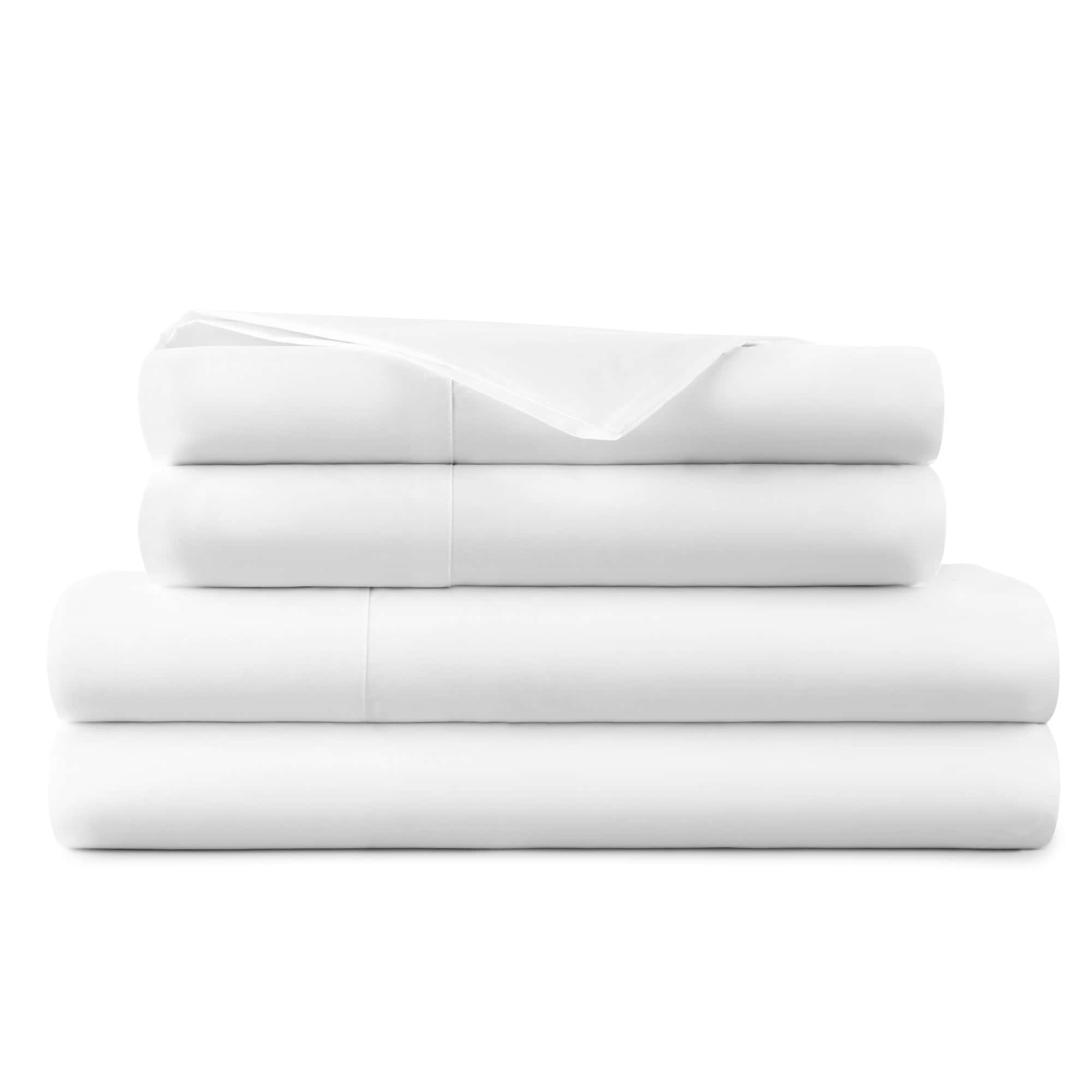 Stack of white folded towels on a white background