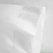 Close-up of a white leather surface with a subtle texture