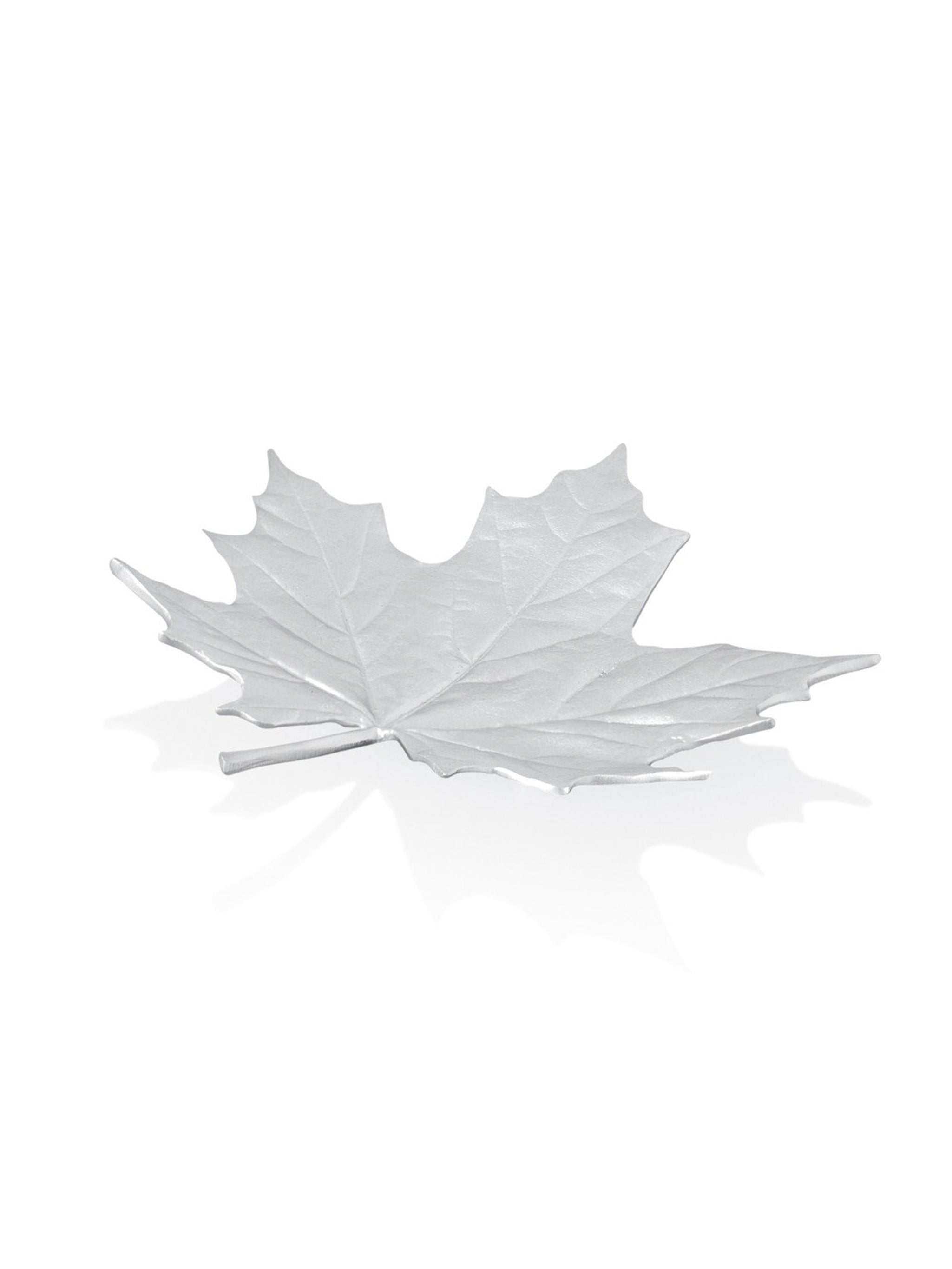 Silver leaf-shaped dish on a white background