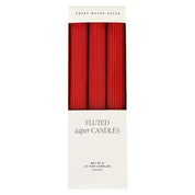 A boxed set of three red fluted taper candles from Sweet Water Decor, shown in its white retail packaging against a plain white background.