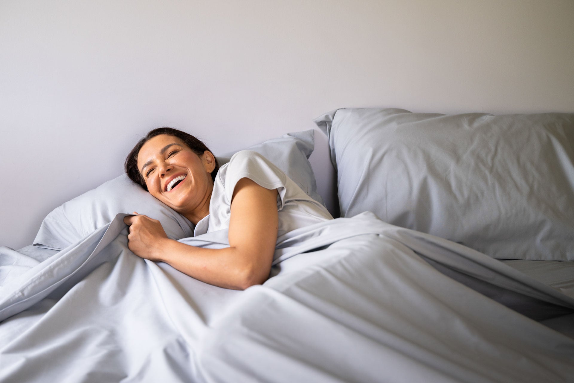 Woman_in_Bed_Color_Grey_Bed_Sheet_Set_Percale_Natural_Cotton_Made_in_USA.jpg