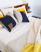Casa Cubita Blanket on Bed