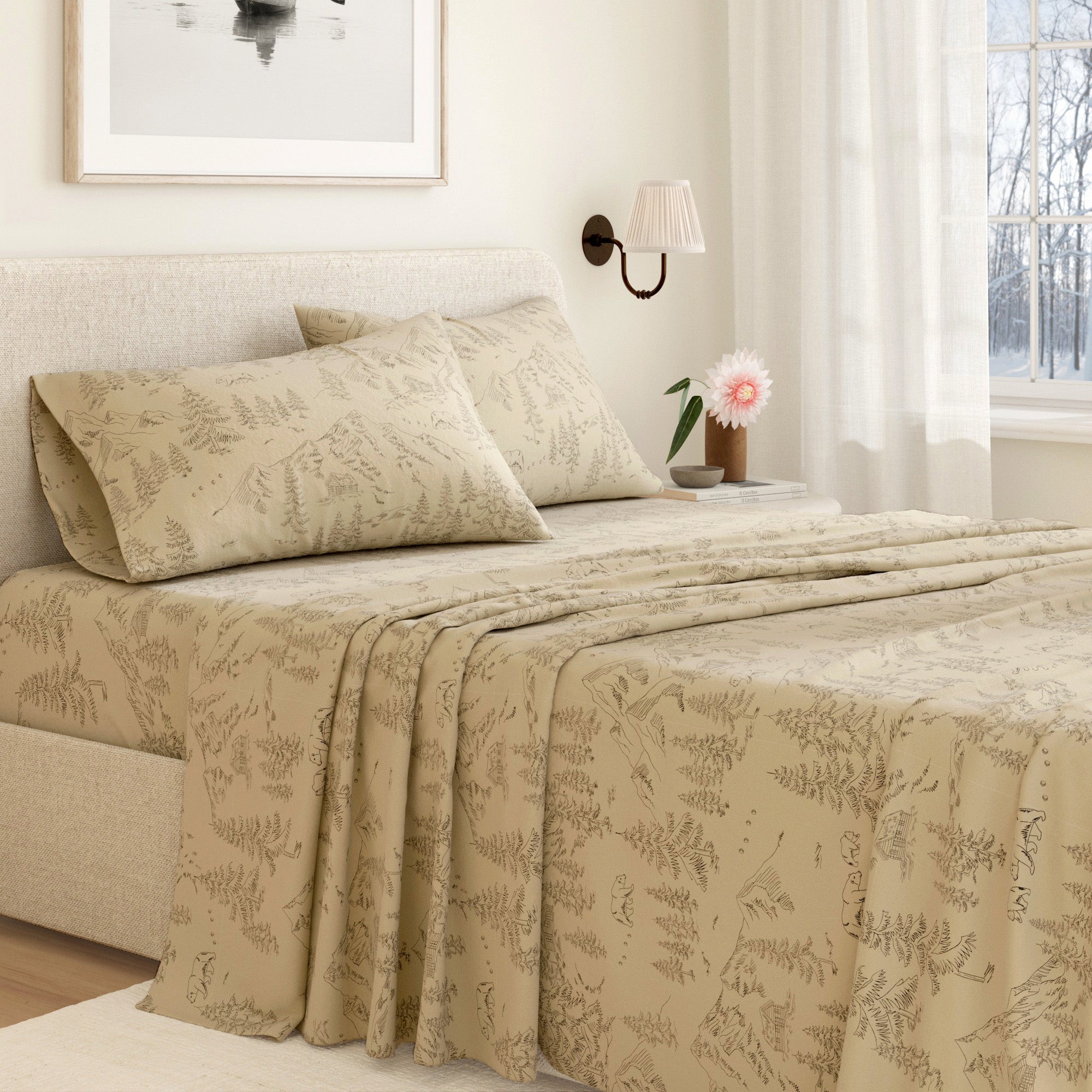 Beige floral-patterned bedspread on a neatly made bed in a bedroom setting.