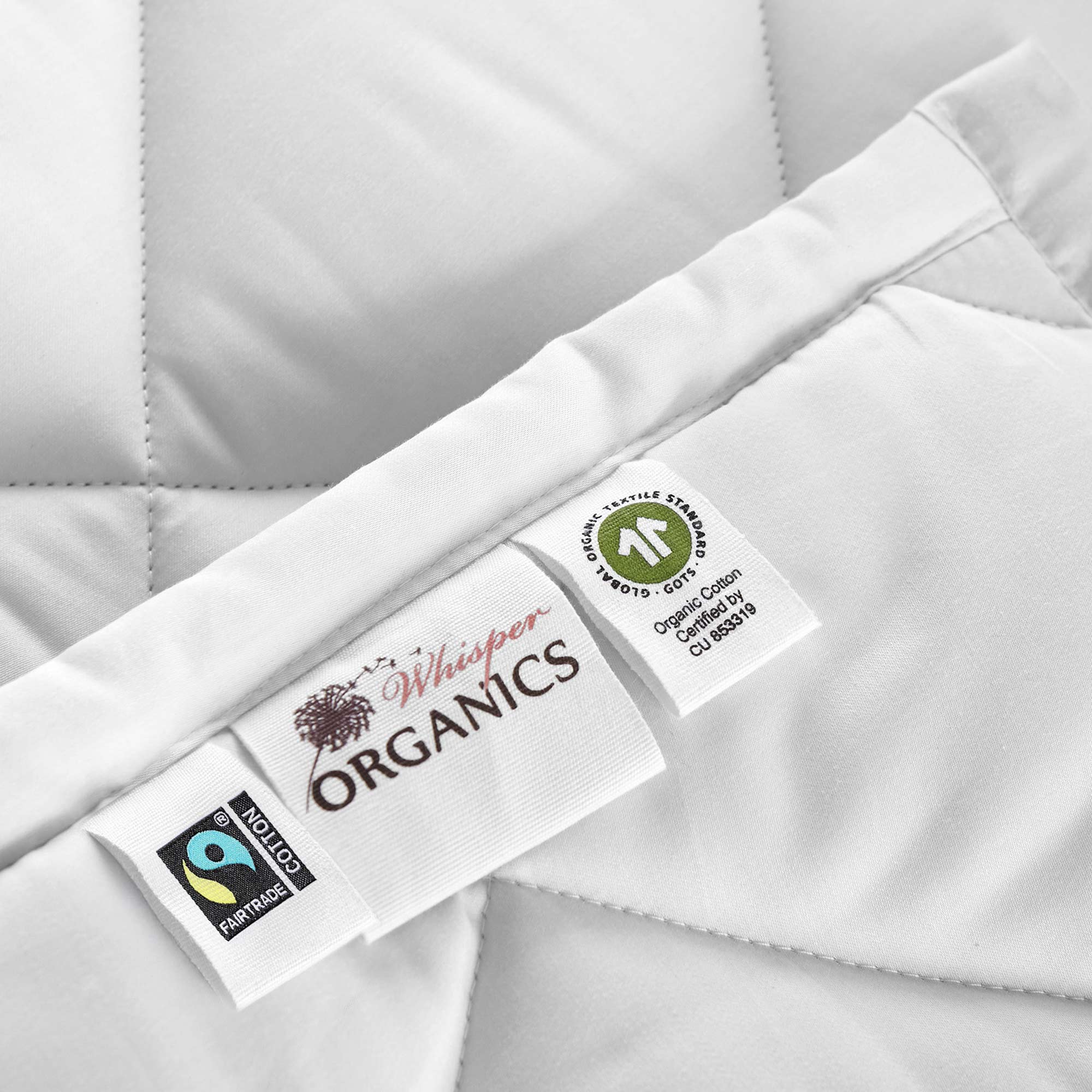 closeup-240gsm-organic-cotton-comforter-gots-fairtrade-labels.jpg