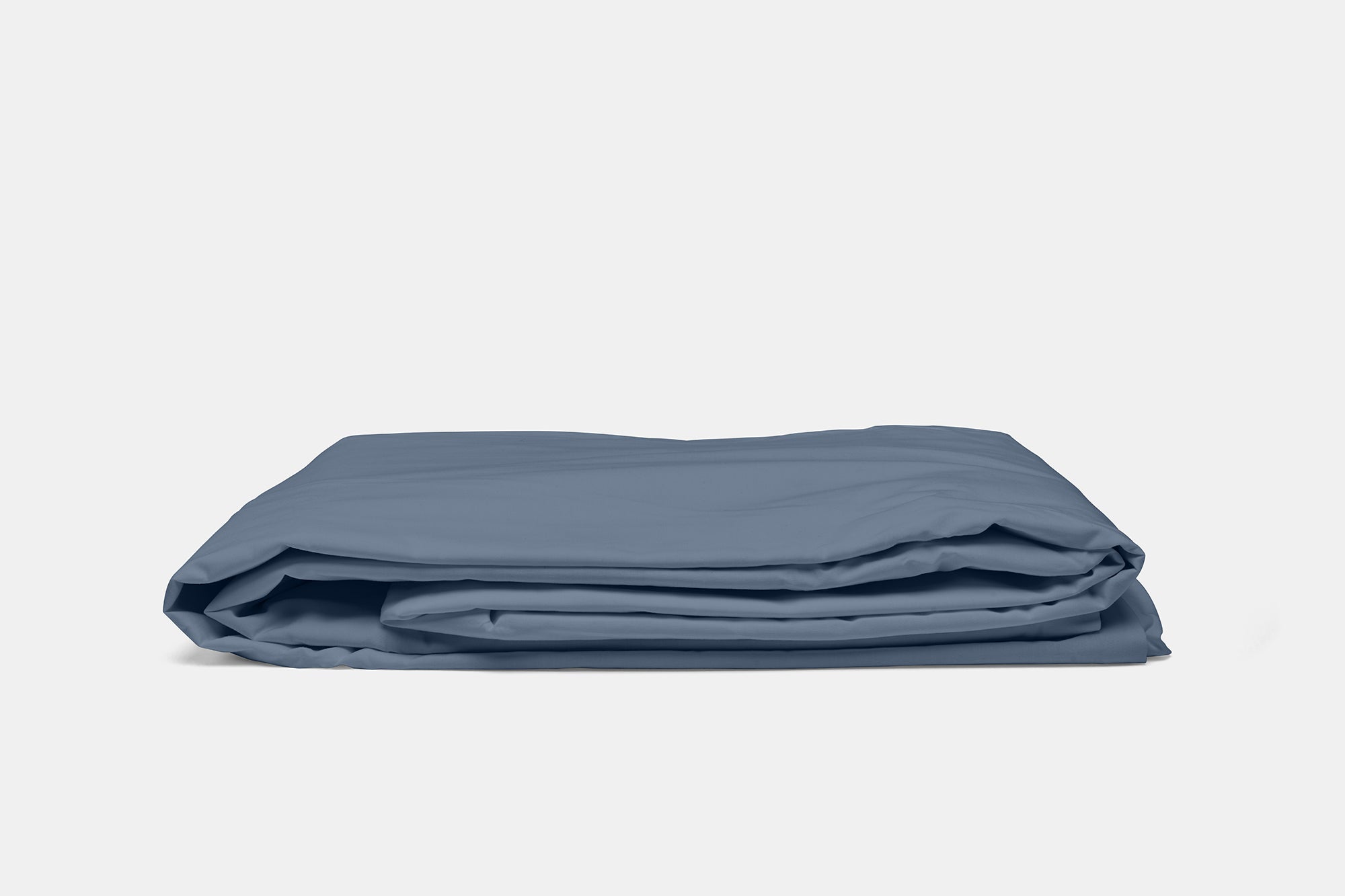 duvet_blue_folded_lowangle_126e17e3-bd7e-4369-aff7-7c18e1340c3d.jpg