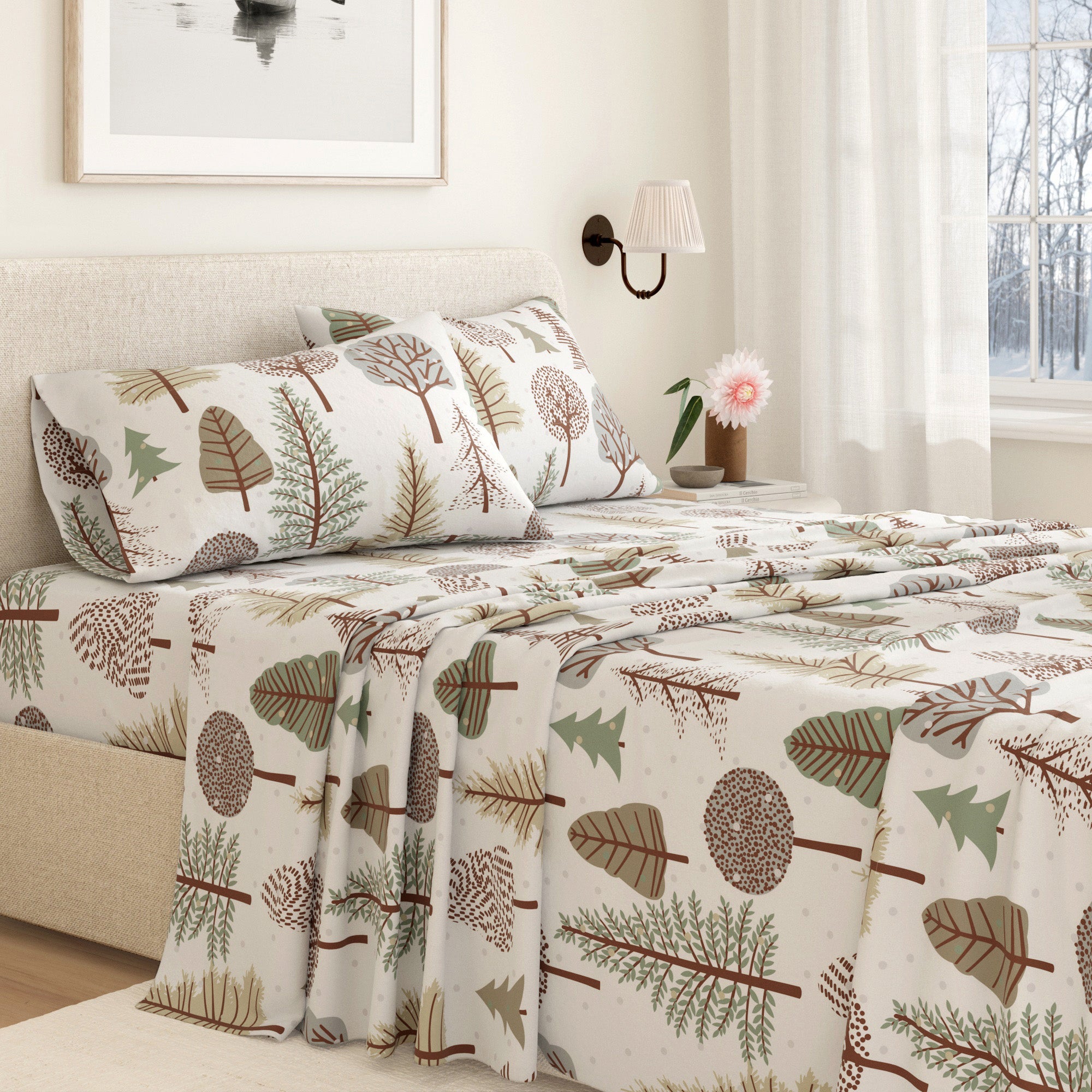 Bed with forest-themed bedding in a bedroom setting