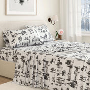 Bedding set with nature-themed design in a bedroom setting