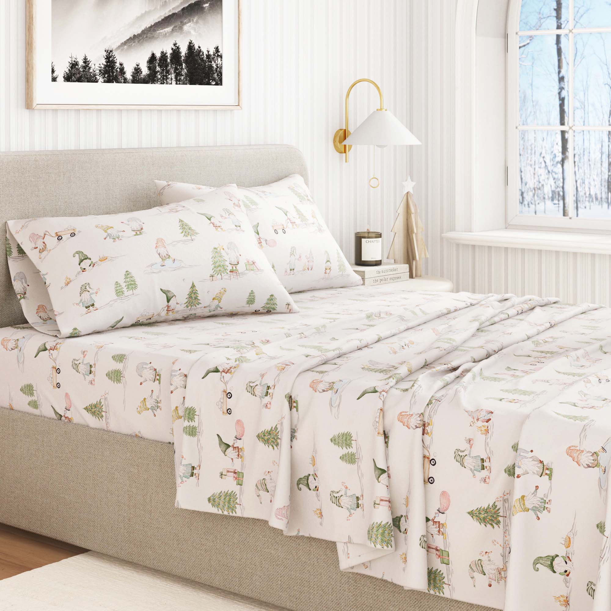Bed with patterned bedding in a bedroom setting