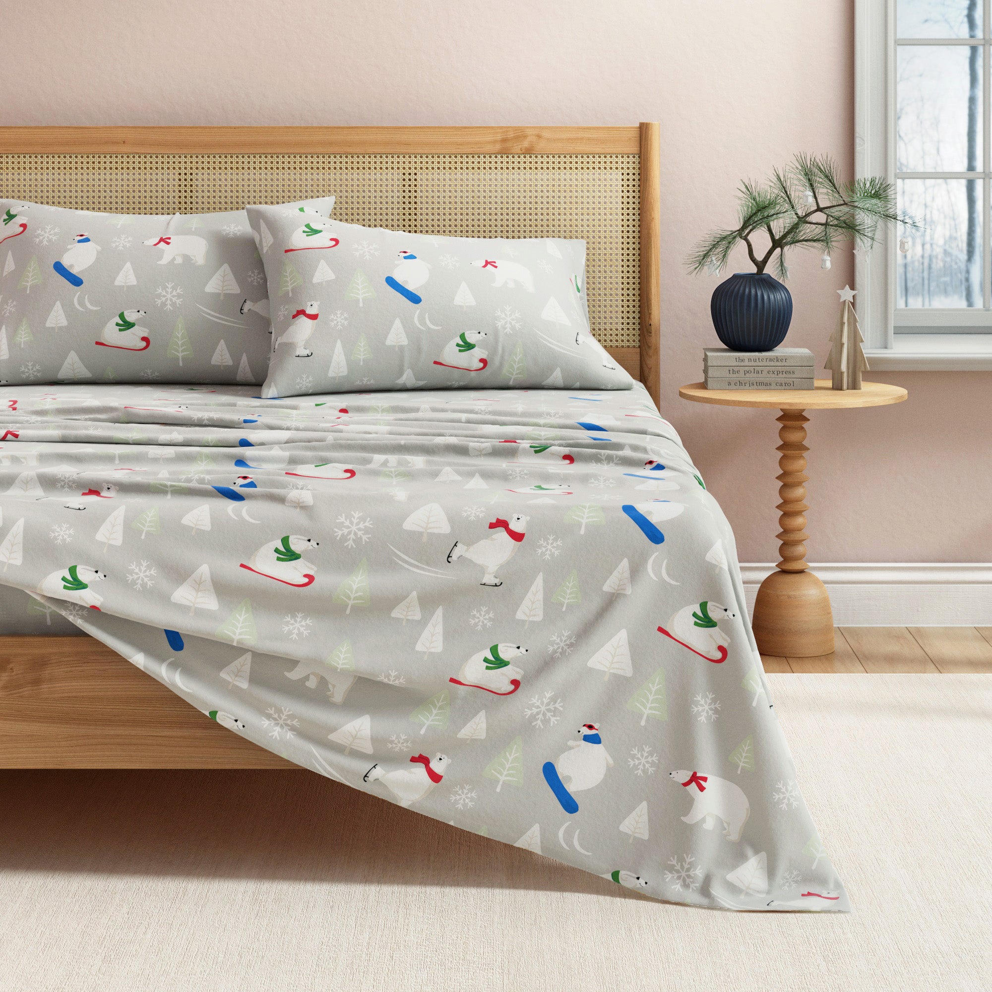 Bed with festive patterned bedding in a bedroom setting