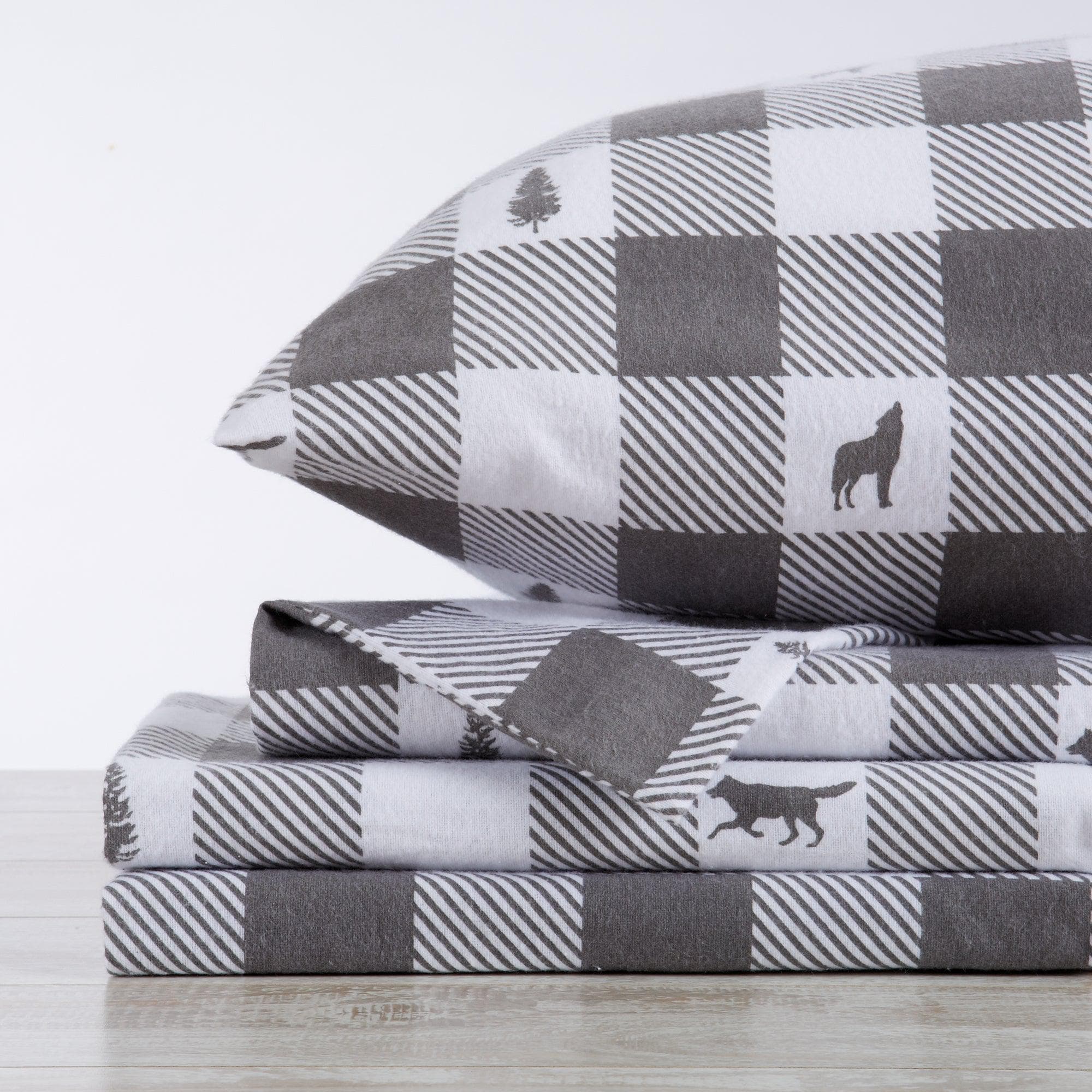 Gray and white checkered bedding set with animal icons on a light background