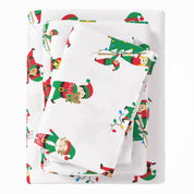 White blanket with Christmas elf pattern on a white background