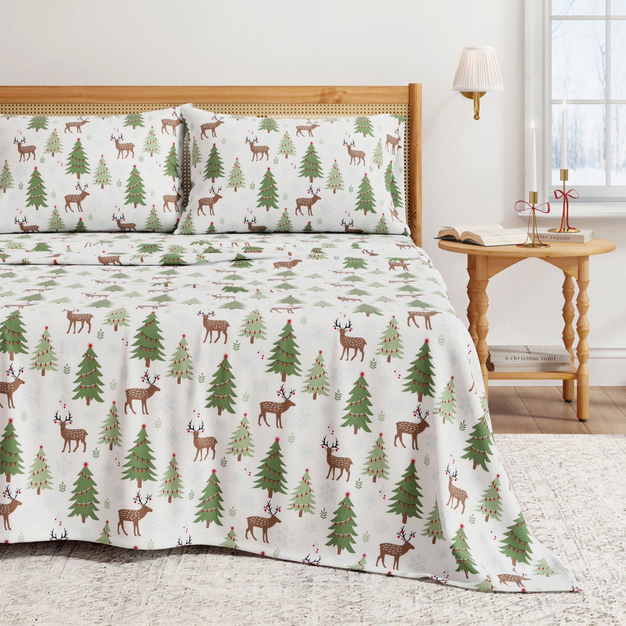 Christmas-themed bedspread with reindeer and trees on a bed in a bedroom setting.