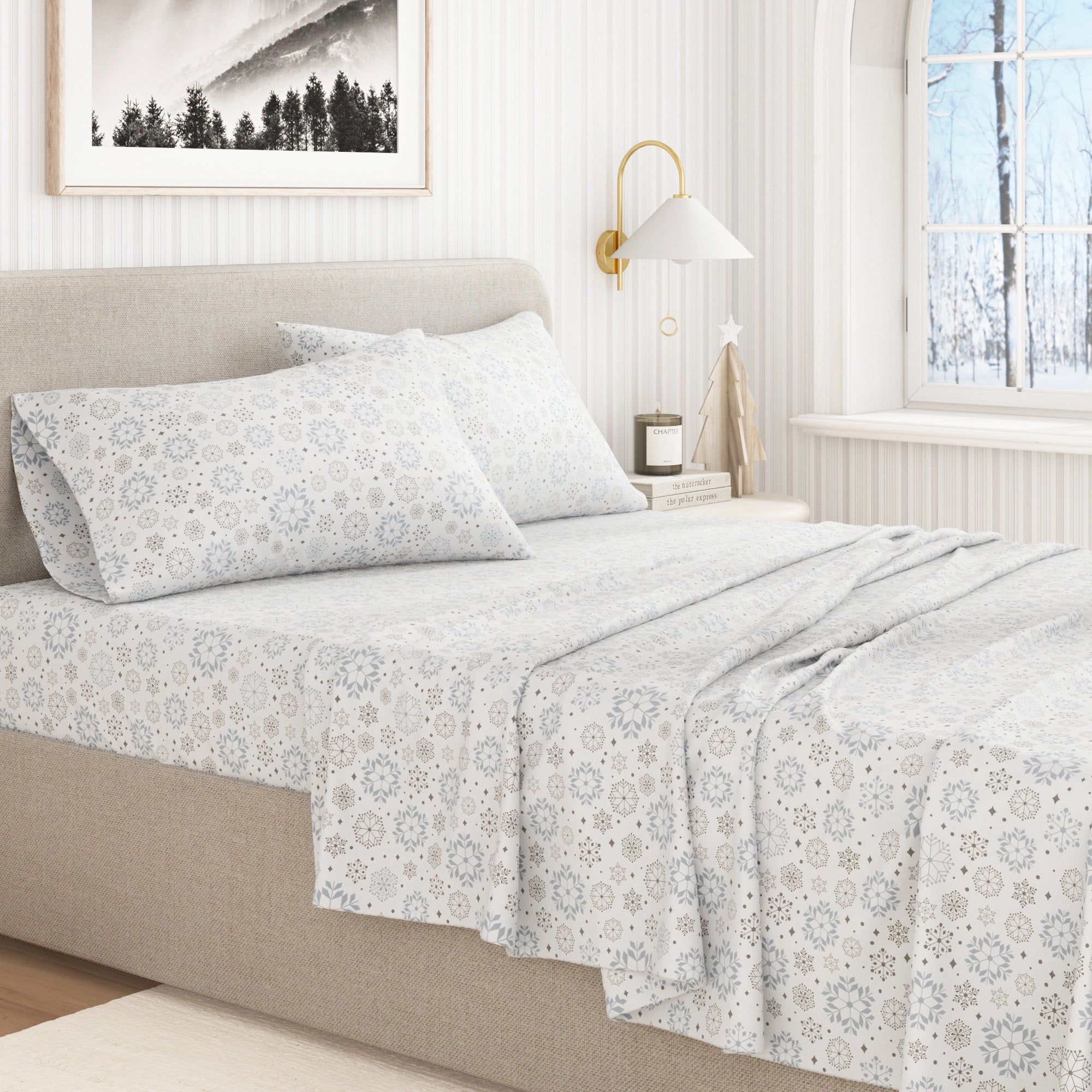 Bed with floral-patterned bedding in a bright bedroom