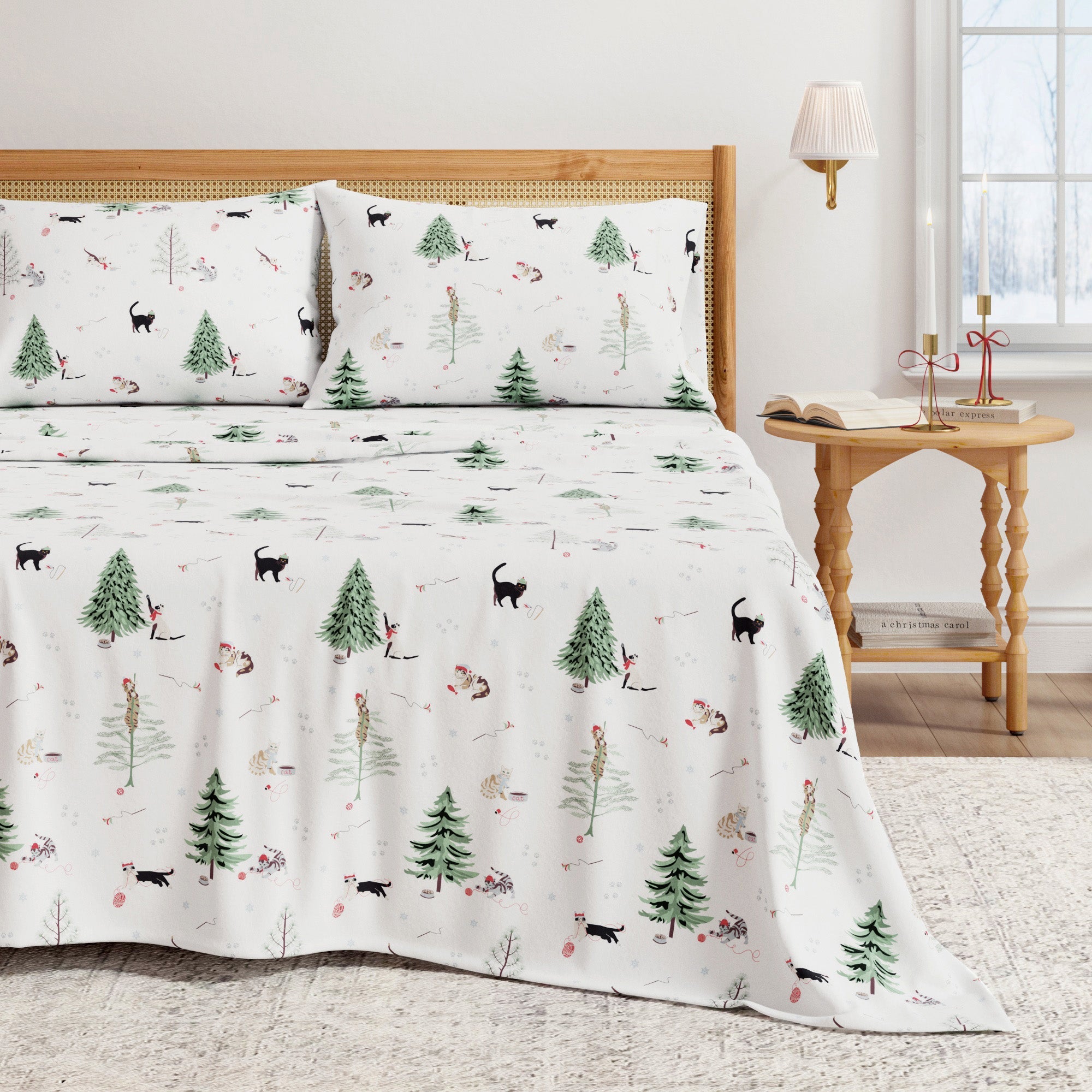 Bedding set with nature-themed design featuring trees and animals on a bed in a room.
