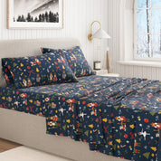 Bed with colorful patterned sheets in a bedroom setting