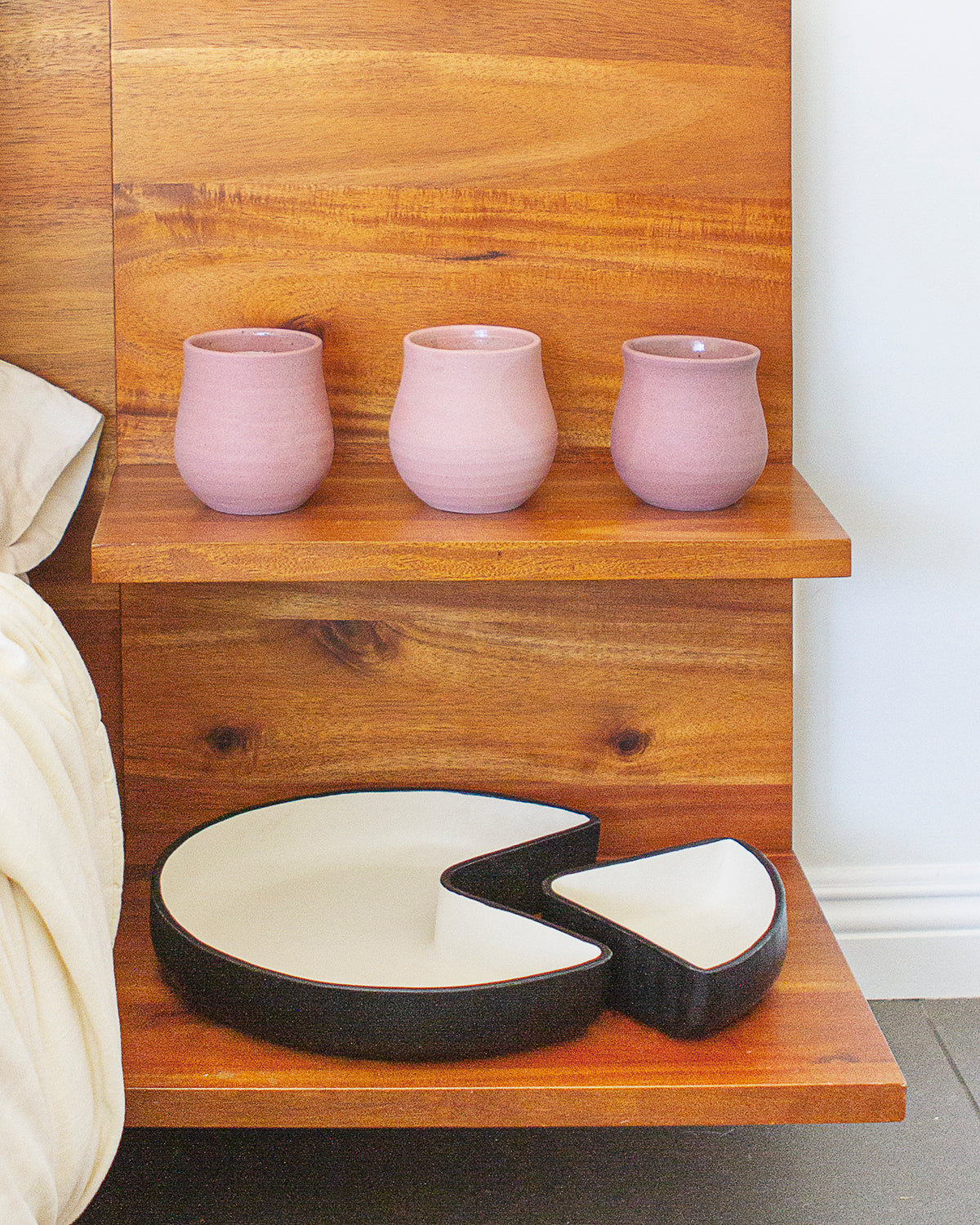 3 Flor Scented Candles on nightstand