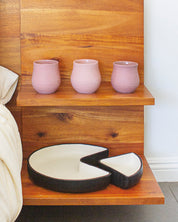 3 Flor Scented Candles on nightstand
