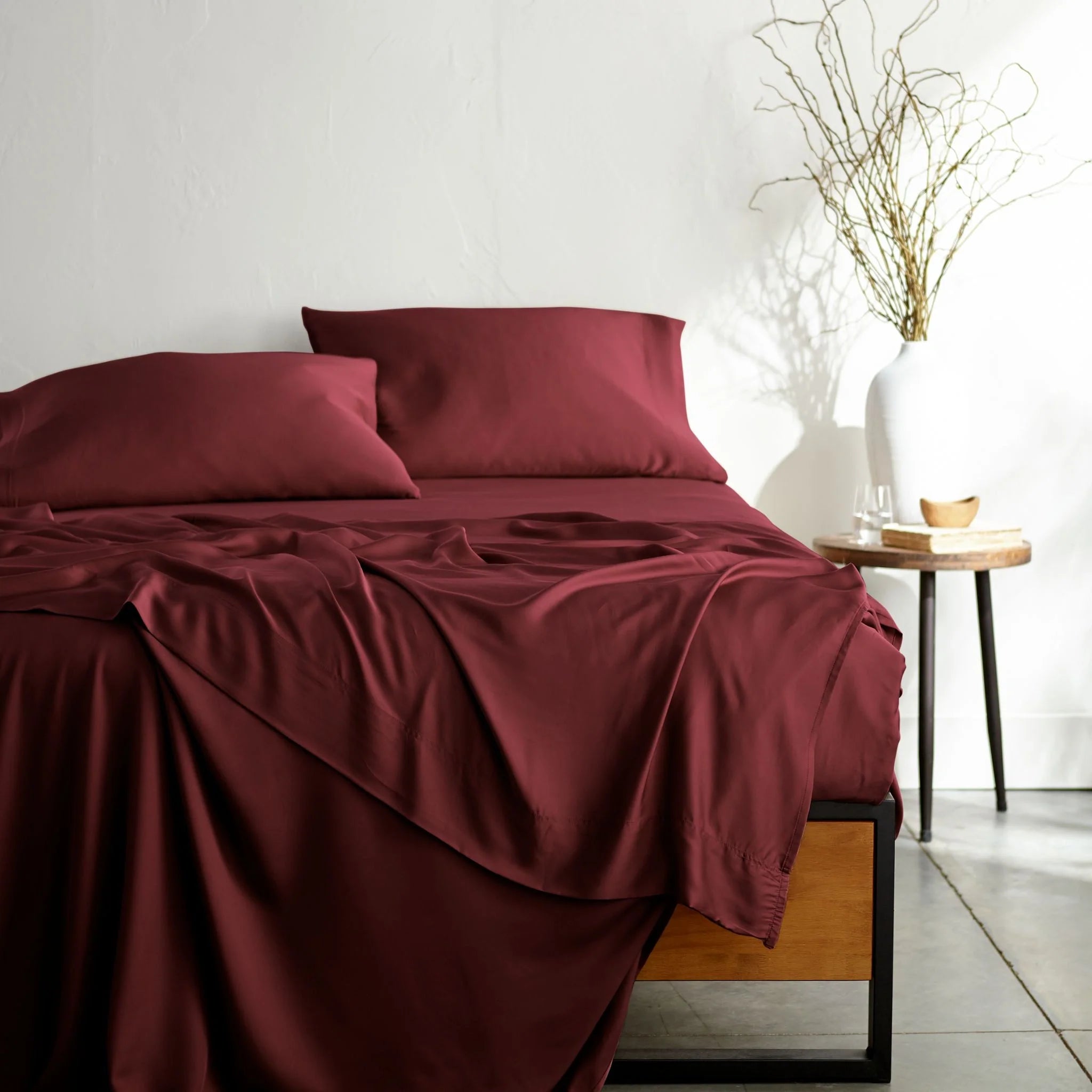 ruby-red-bamboo-bed-sheets-foot-view.webp
