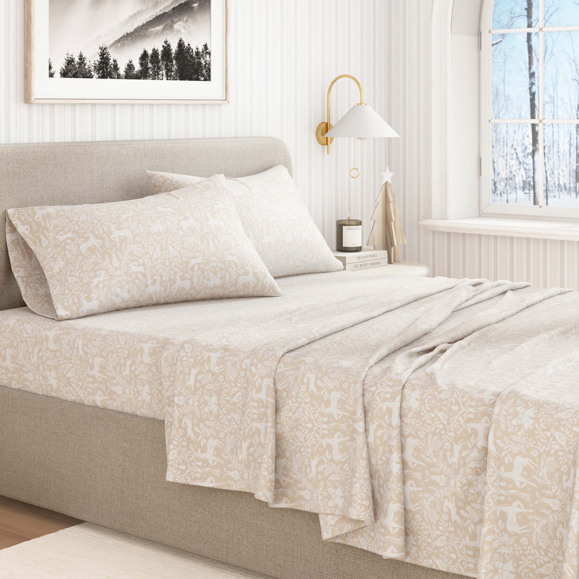 Neatly made bed with beige floral-patterned bedding in a bright bedroom.