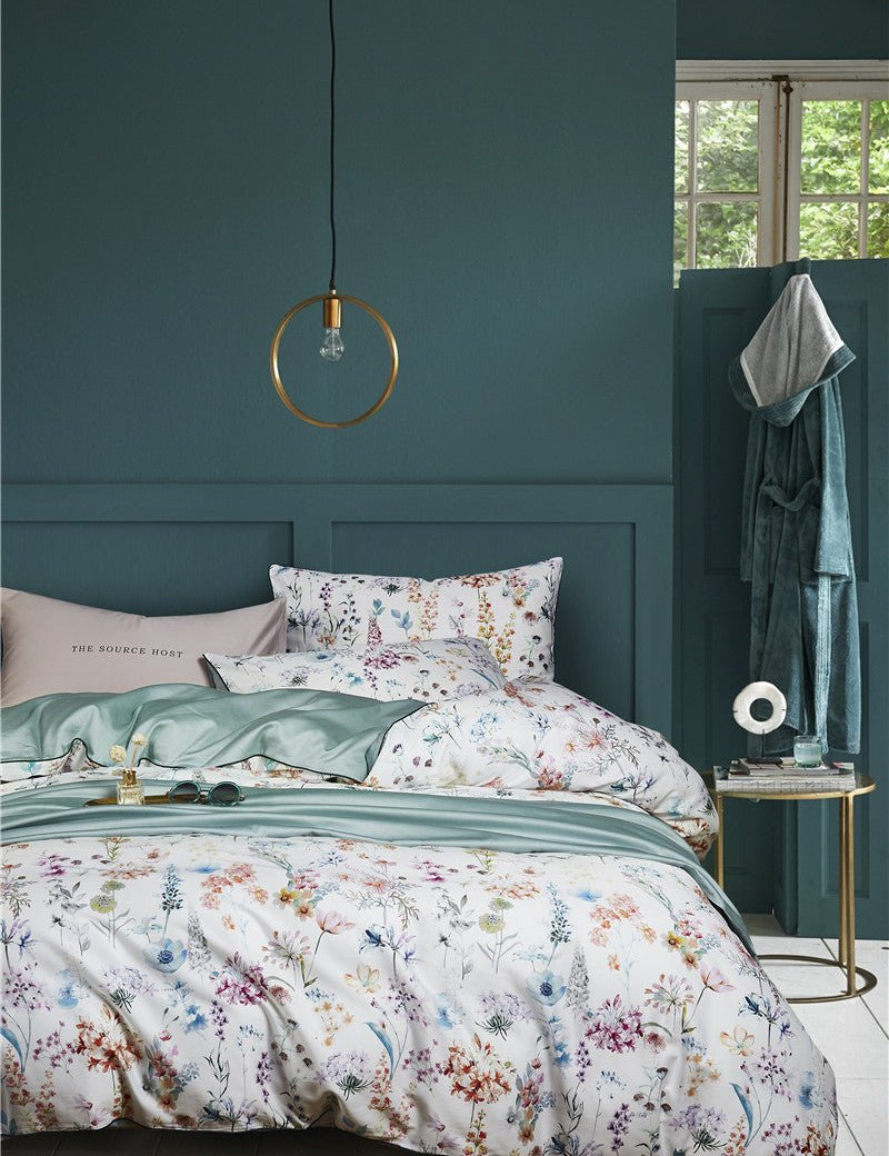 Blooming Jade Bedding Set on a bed