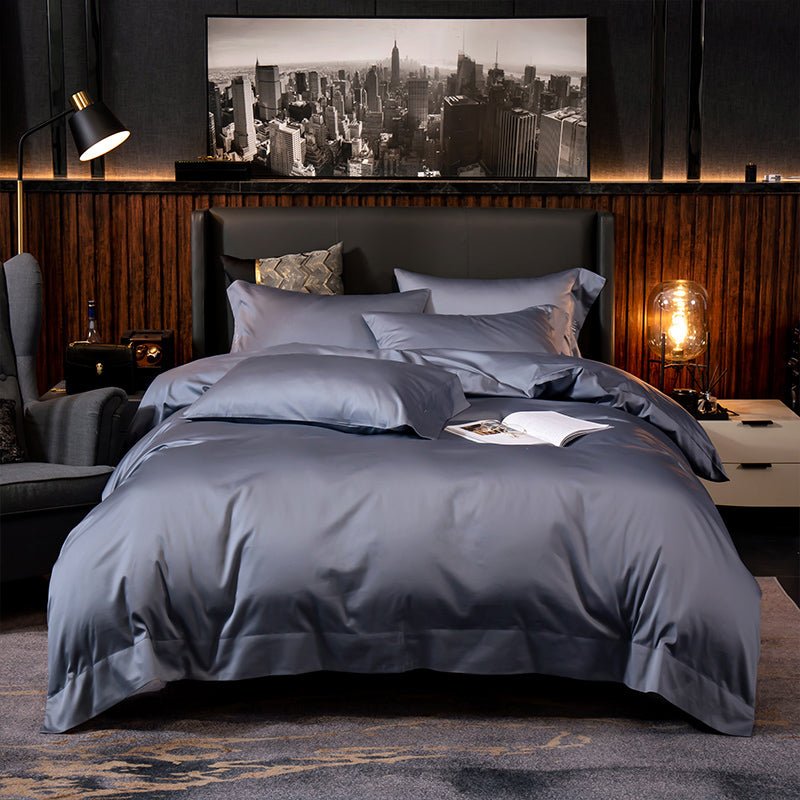 Empire Steel Blue Bedding Set on a bed - front view