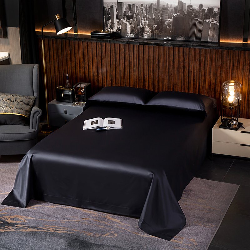 Flat sheet from the Noble Black Bedding Set on a bed