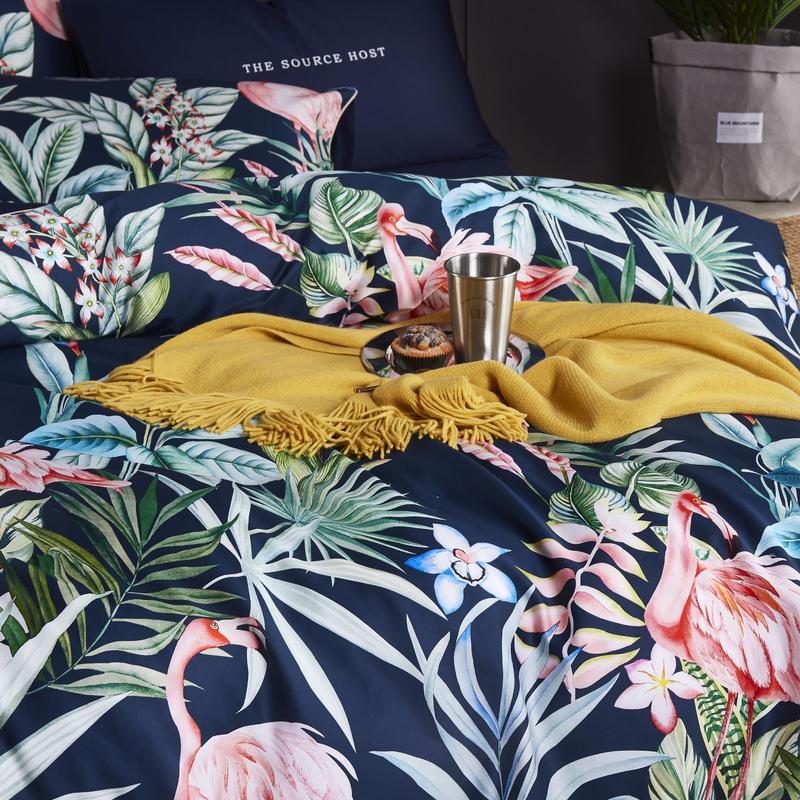 Navy Flamingo Bedding Set on a bed - close in view