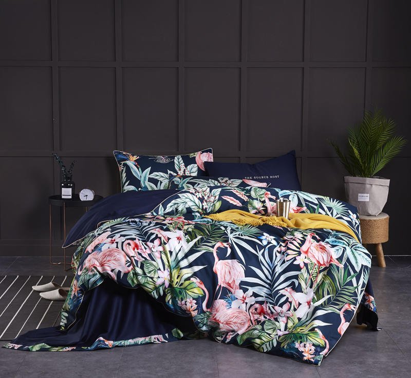 Navy Flamingo Bedding Set on a bed - front view