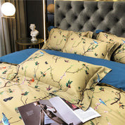 Golden Songbirds Bedding Set on a bed